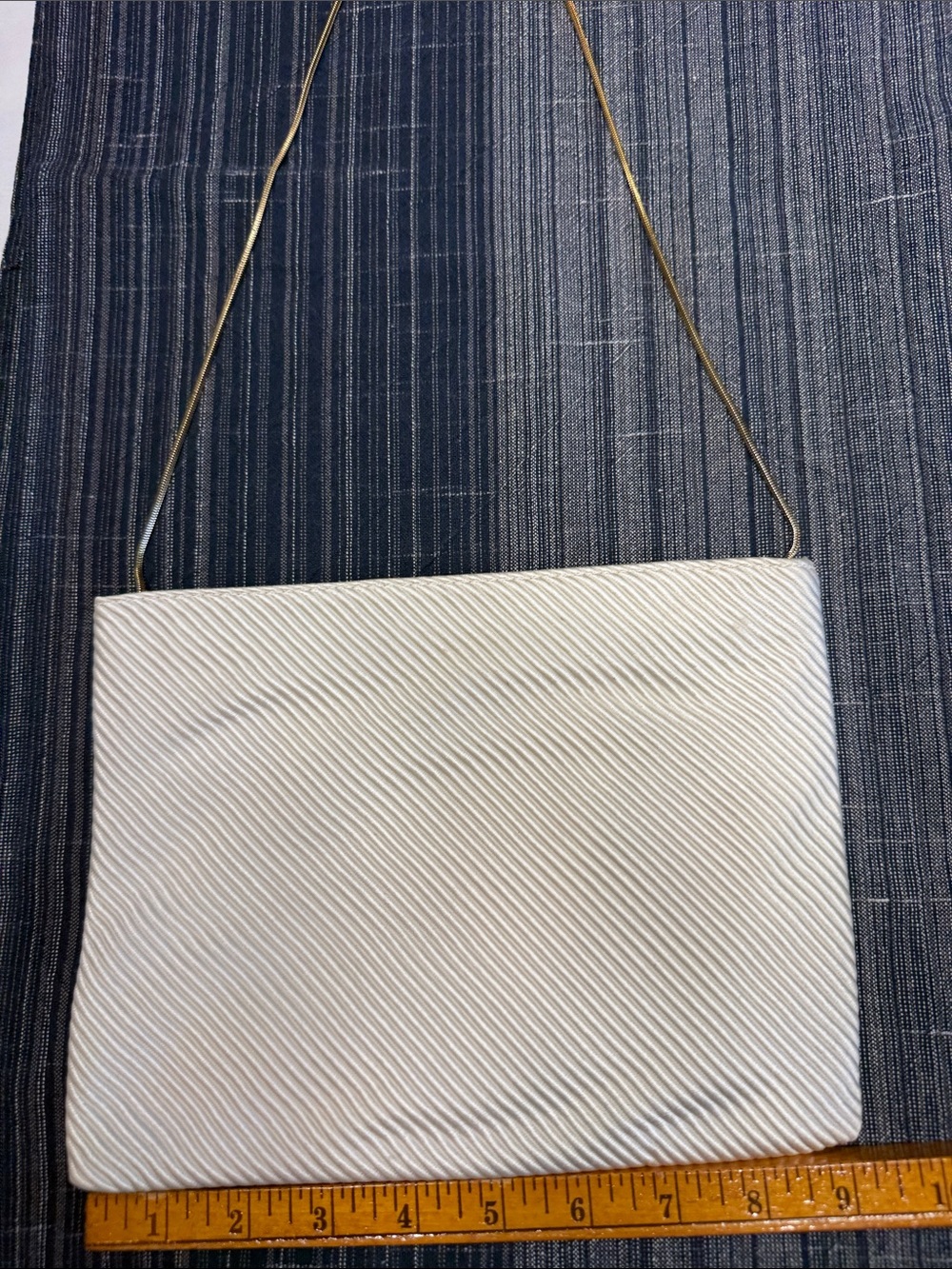 Elegant Cream Textured Clutch by REVA with Gold Chain